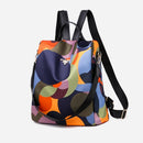 Mochila Feminina Antifurto Colorida Impermeável – Oxford Premium para Viagens, Trabalho e Dia a Dia